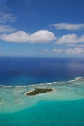 Aerial view of Aitutaki lagoon, Cook Islands by Richard Smith 